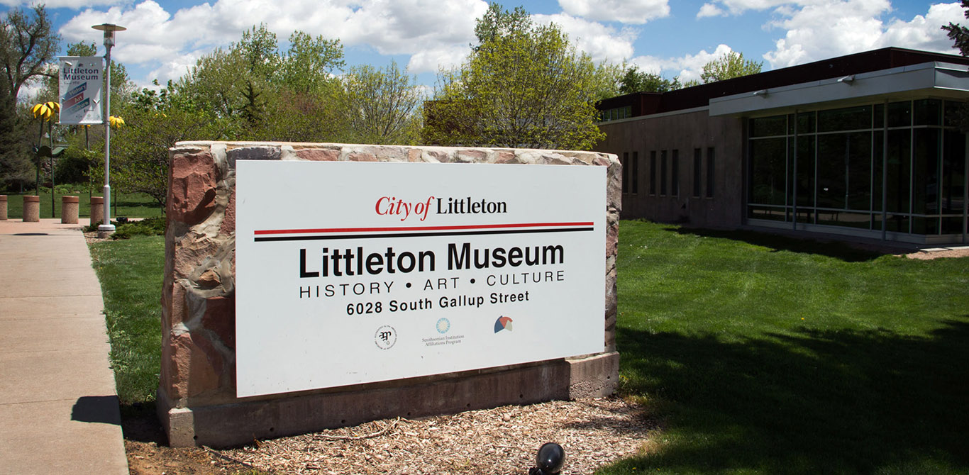 Littleton Museum sign in front of museum desktop