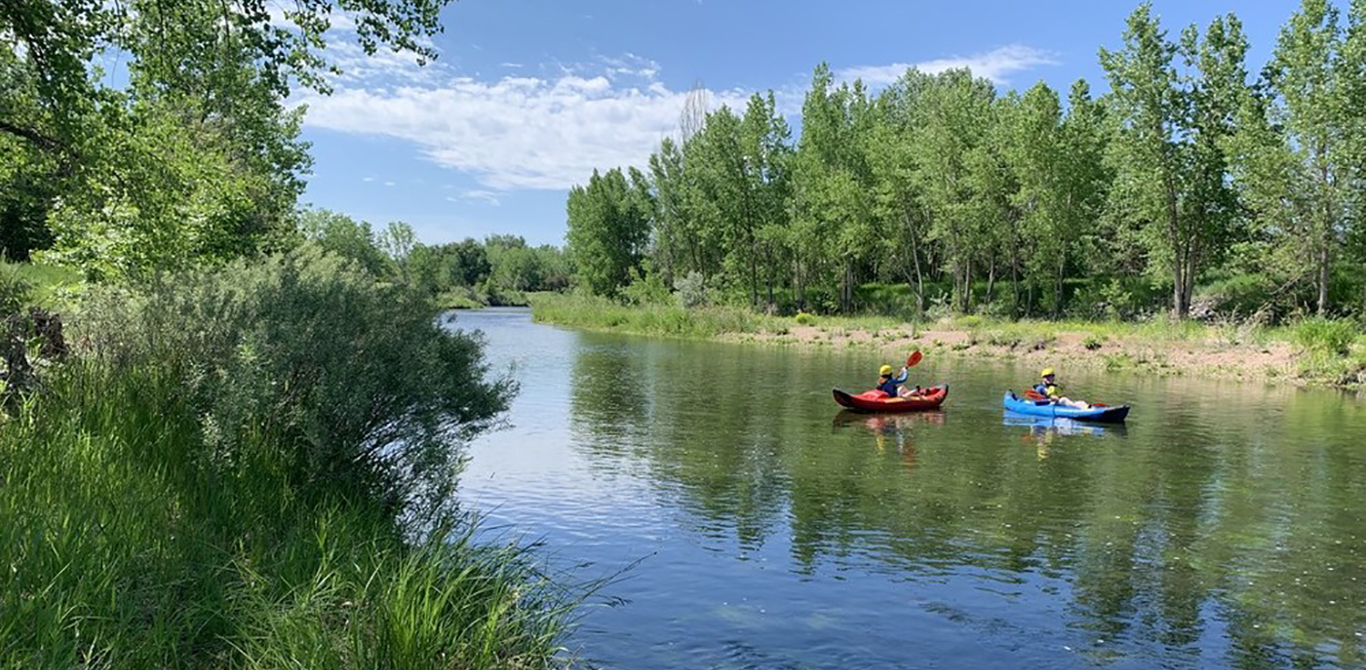 Couple walking on High Line Canal trail in winter.