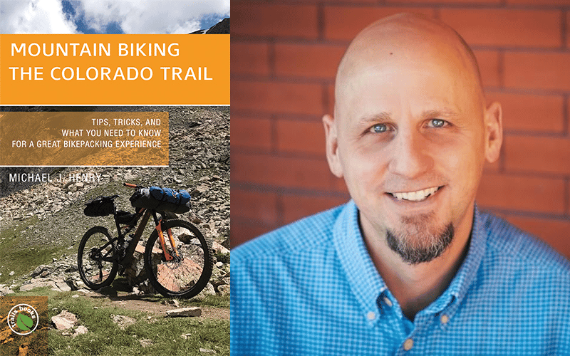 Book Cover of Mountain Biking the Colorado Trail and author Michael J. Henry