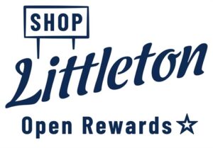 Shop Littleton Open Rewards logo featuring the words 'Shop Littleton' in stylized blue text and 'Open Rewards' with a star next to it, all on a white background. 